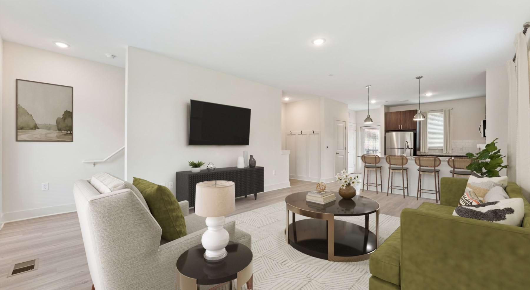 large living room with wood flooring