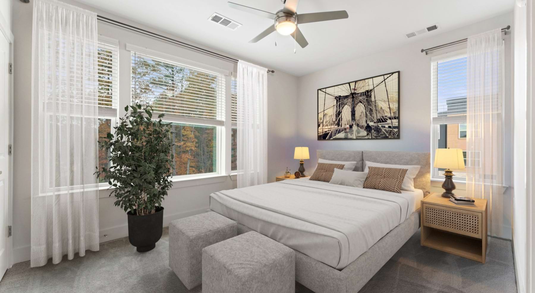 bedroom with windows and carpeting
