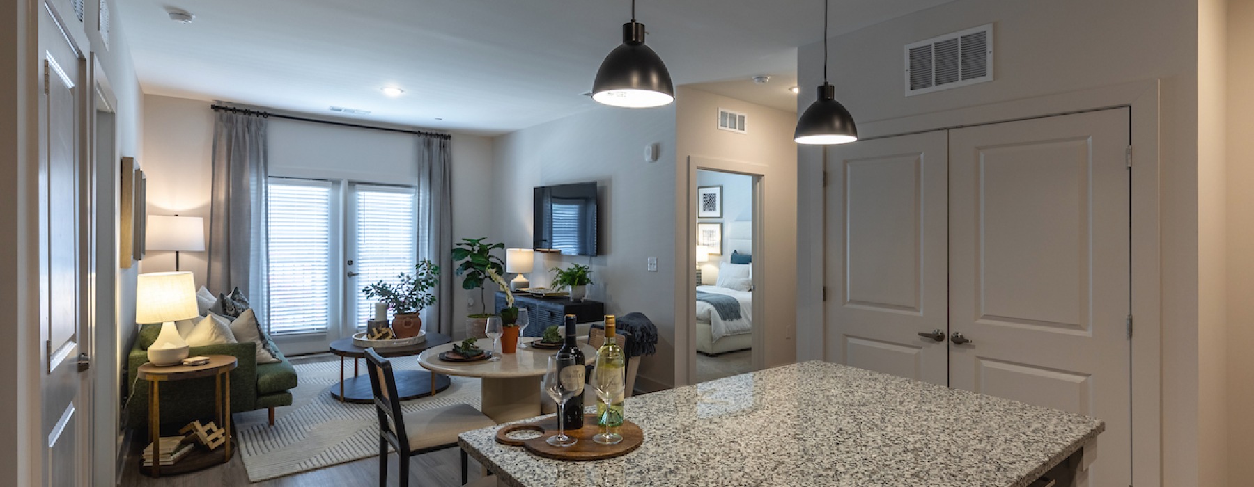 Living room from kitchen with granite countertops