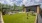 jumbo Jenga and corn hole on large game lawn